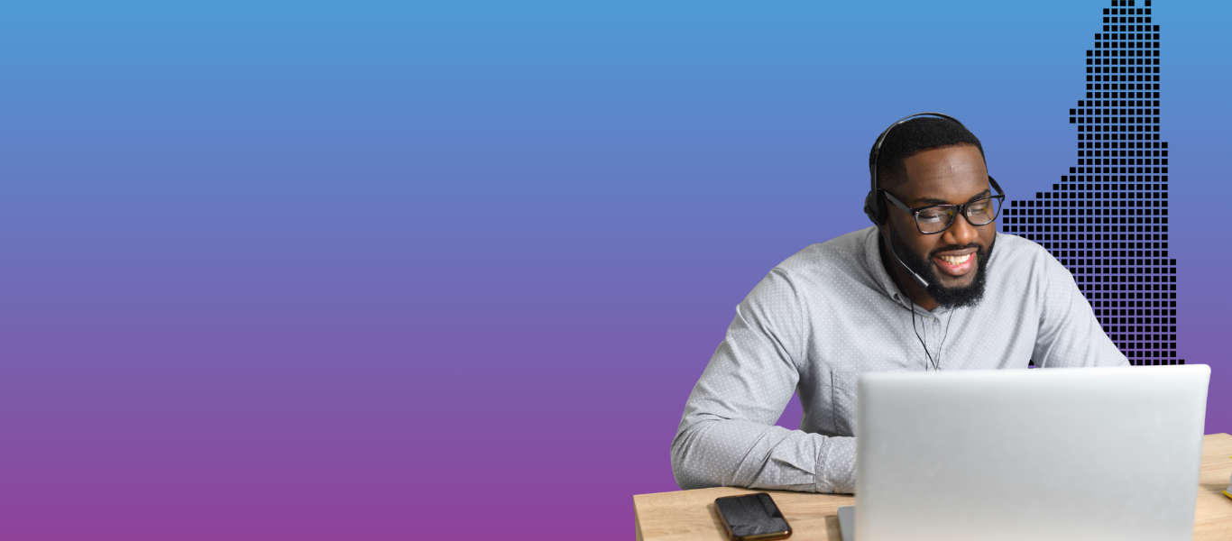 Man wearing a headset and glasses sits at a desk using a laptop, with a phone nearby. The background is a gradient with a pixelated building silhouette on the right.